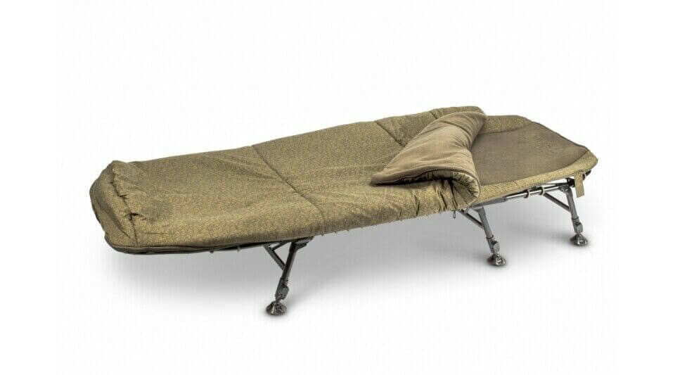 nash-t948-sleeping-system Die Nash Liege wir mit dem passenden Schlafsack geliefert und kann auf ein kleines Packmaß zusammengeklappt werden.