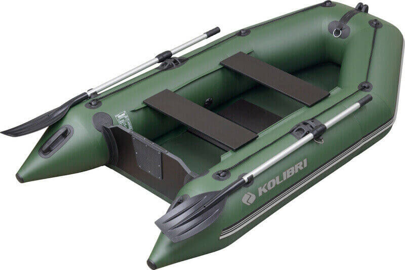 Schlauchboote für Angler - Kaufberatung / Testberichte Robustes aufblasbares Fischerboot mit Rudern, perfekt für Karpfenangler auf dem Wasser.