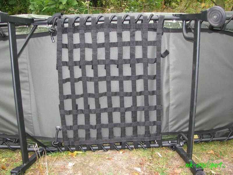 HOT-SPOT-Advantage-Matratzenunterstuetzung-png Resistente poltrona da pesca con robusta rete nera per il massimo comfort durante le lunghe sessioni.