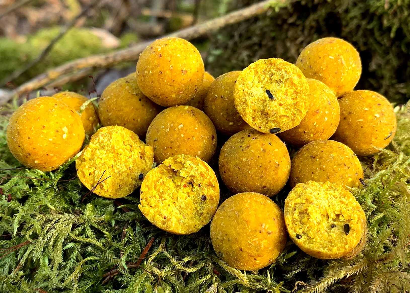 2QQcw3t0KoDIgF Boilies dal colore giallo brillante ideali per la pesca alla carpa, perfette per attirare grosse prede.